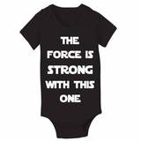 The Force Is Strong (White Ink) Baby One Piece
